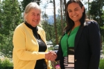 Denise P. (R) - National Nurse Practitioner Symposium Professional Scholarship recipient, congratulated by Ella S. (L) of NNPS